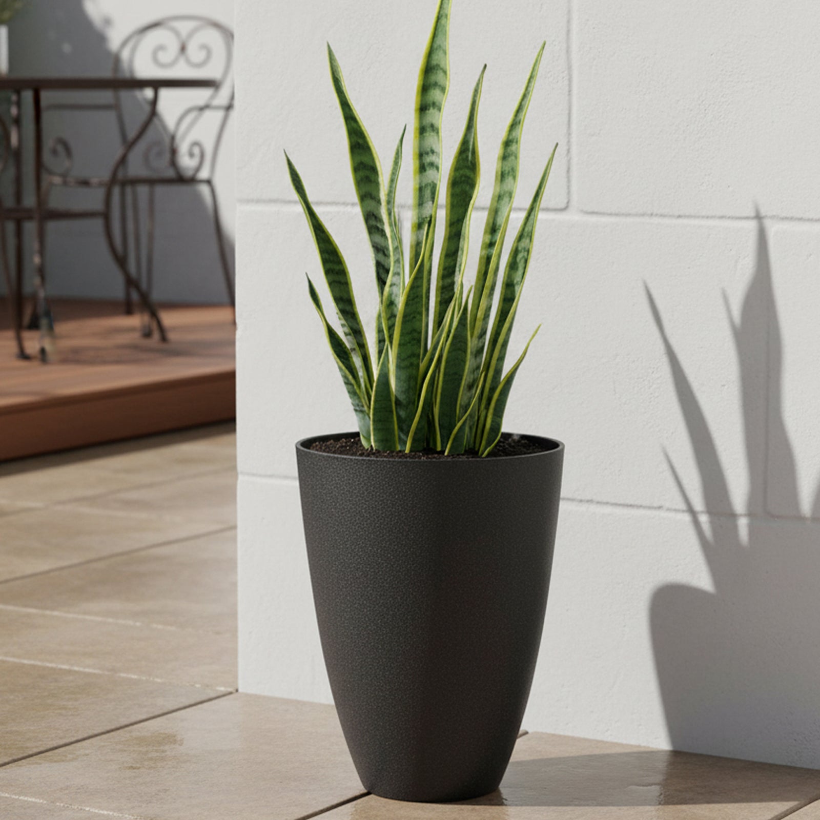 Eden 40cm black tall faux planter for modern indoor and outdoor plant styling