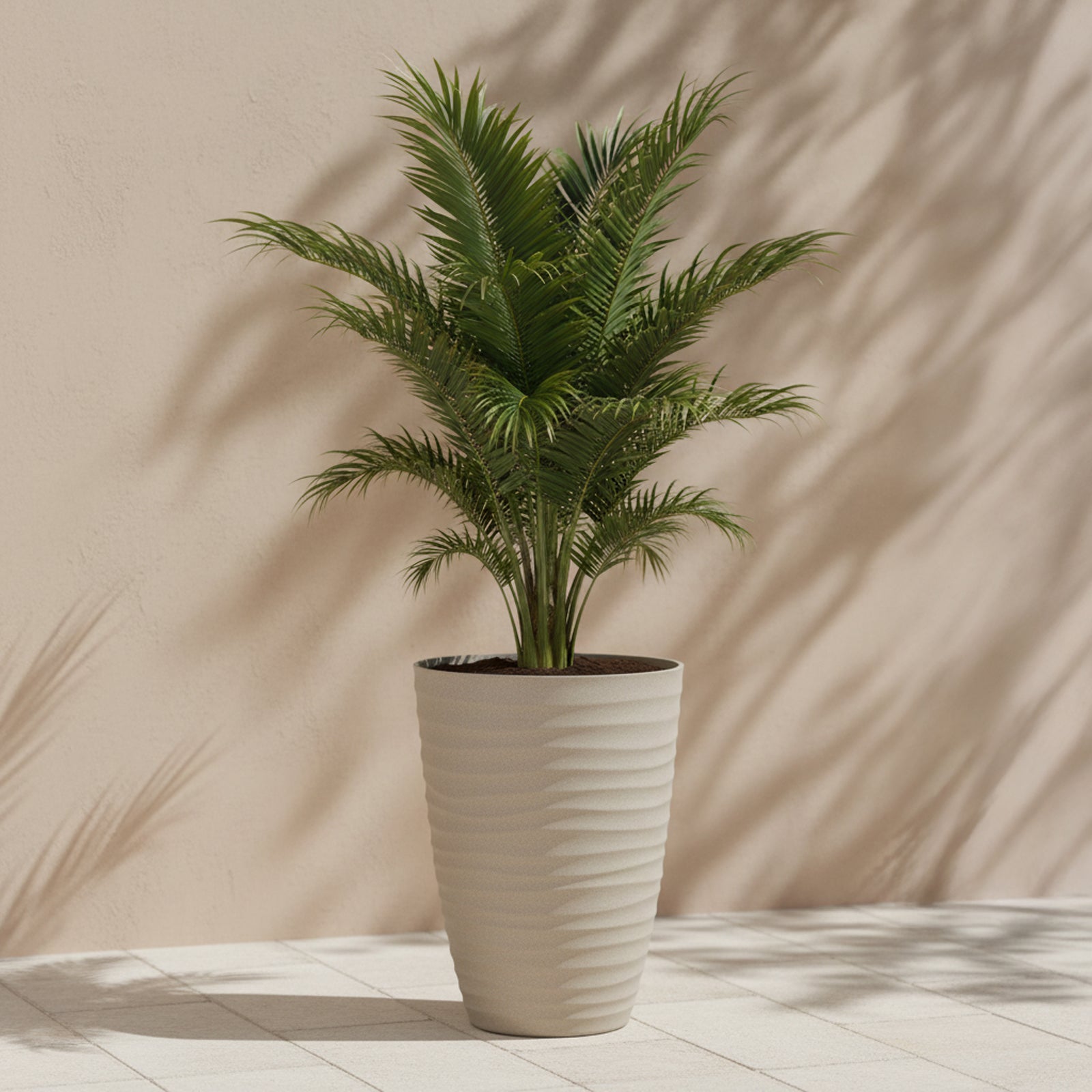 Eden 40cm sandstone tall wavy planter for modern indoor and outdoor plant styling