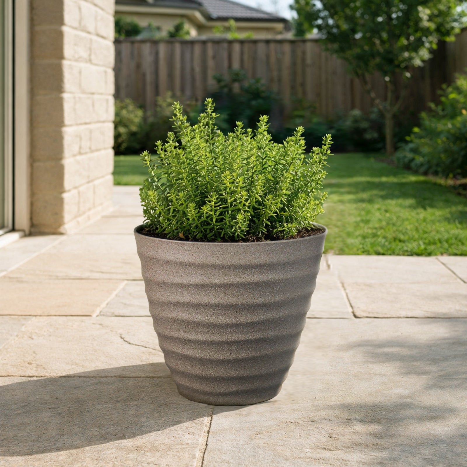 Eden 40cm sandstone wavy planter ideal for larger indoor and outdoor plants