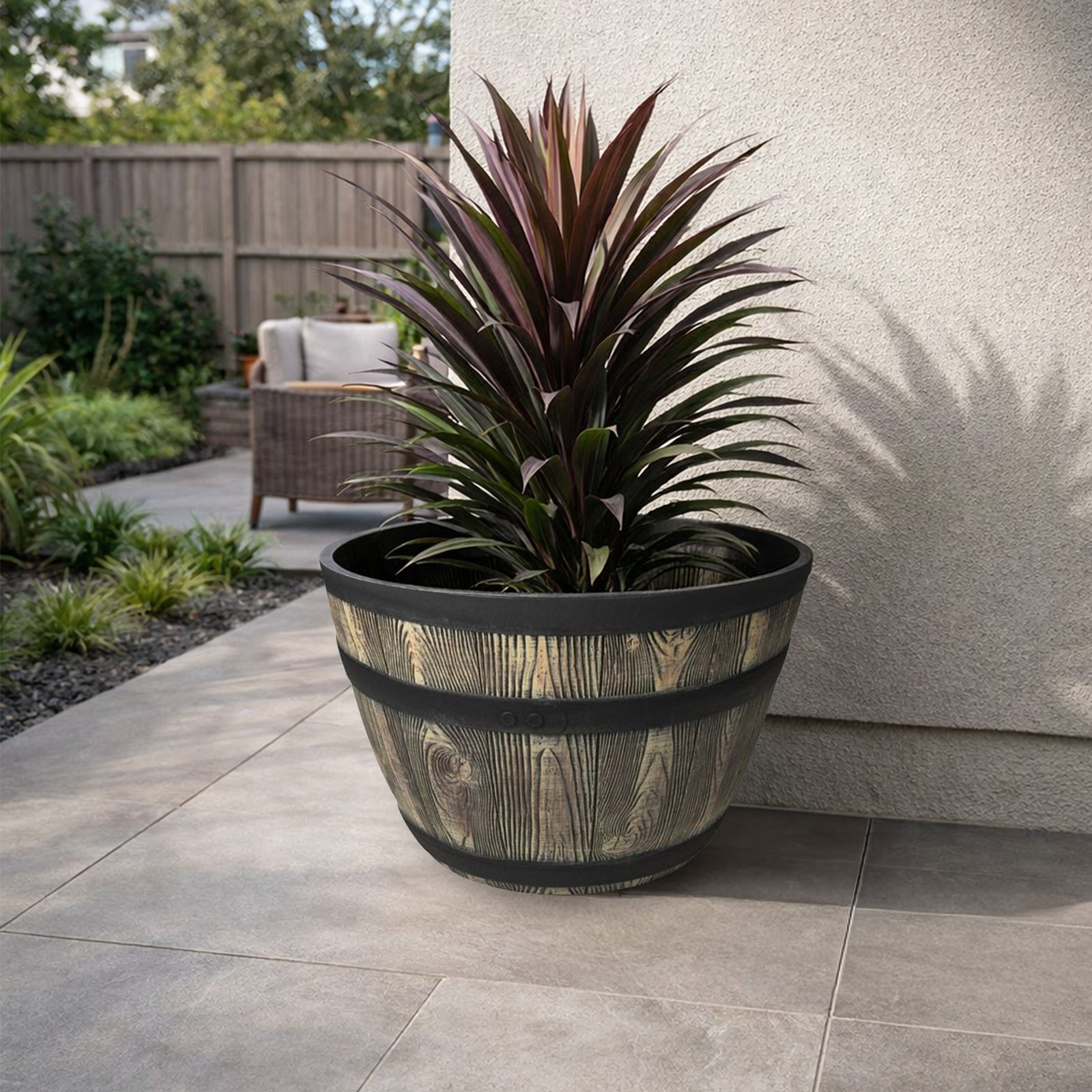 Eden sandstone self-watering round planter for outdoor gardens and patios